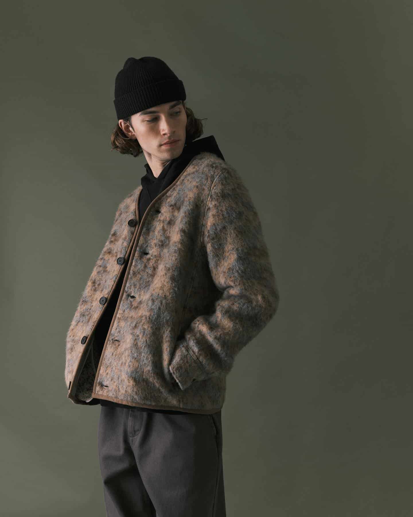 Black Hoodie Under A Camo Jacket